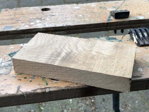 Raw piece of oak wood - right before machining