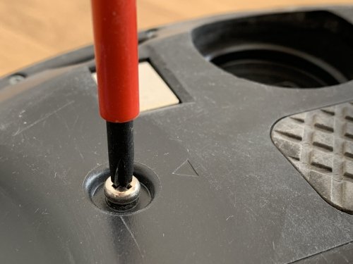 Screws are clearly marked with a triangle